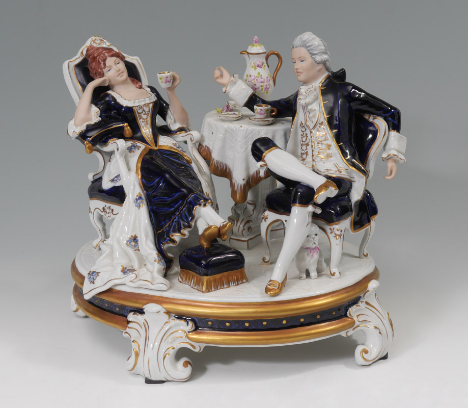 Appraisal: ROYAL DUX PORCELAIN FIGURAL GROUP Figures of finely dressed man