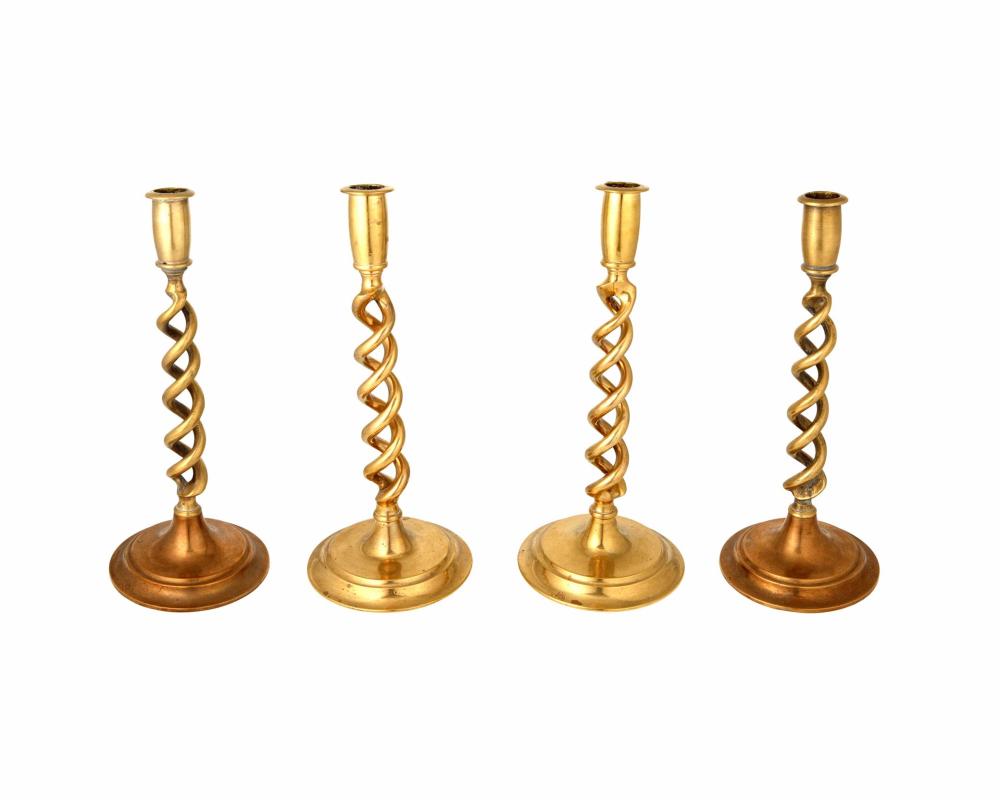 Appraisal: A group of English spiral brass candlesticks th th century