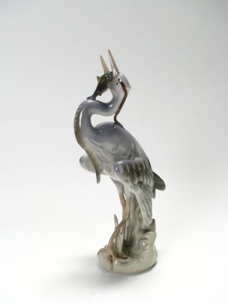 Appraisal: Royal Dux Porcelain Blue Herron Figure swallowing a fish approximately