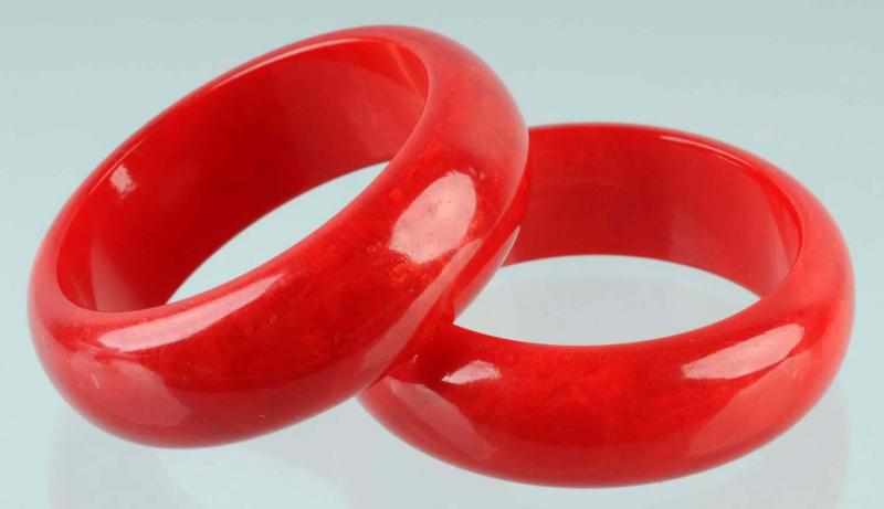 Appraisal: Lot of Bakelite Red Bangle Bracelet Condition Excellent Size Both