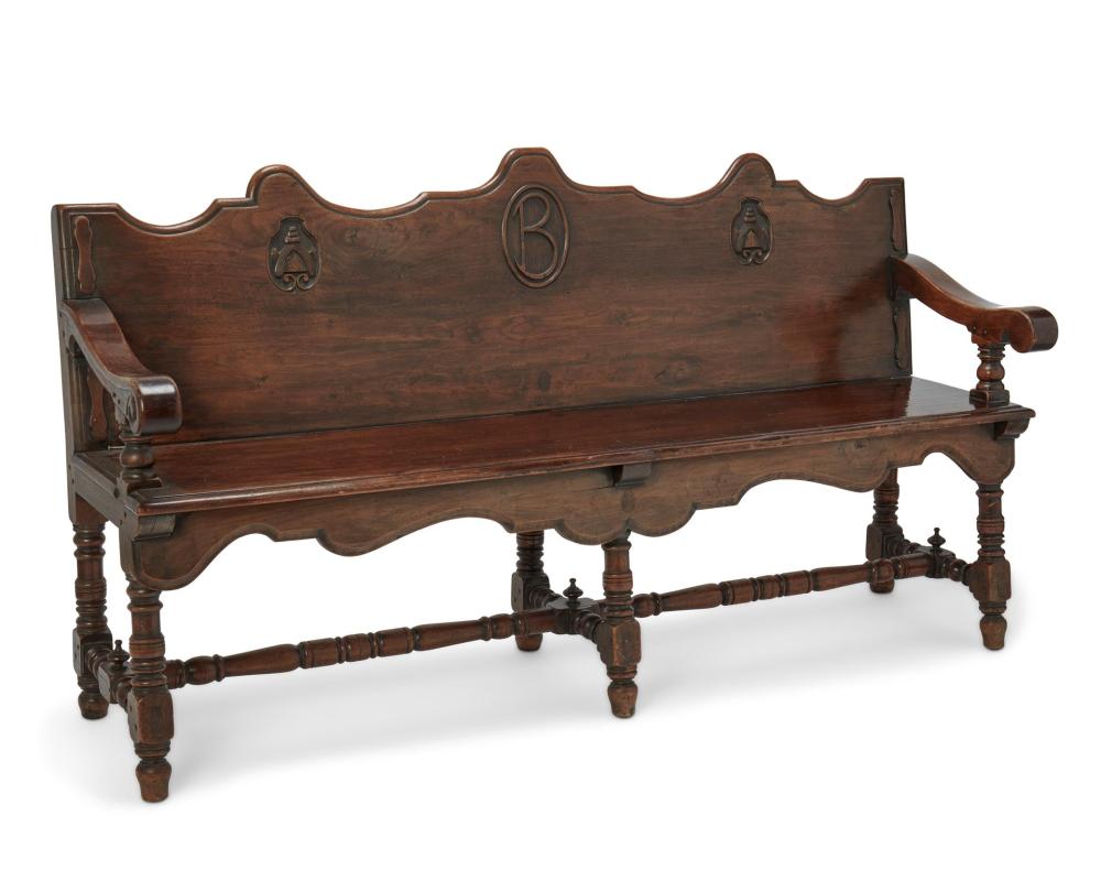 Appraisal: A George Hunt Spanish Colonial Revival walnut bench Circa s