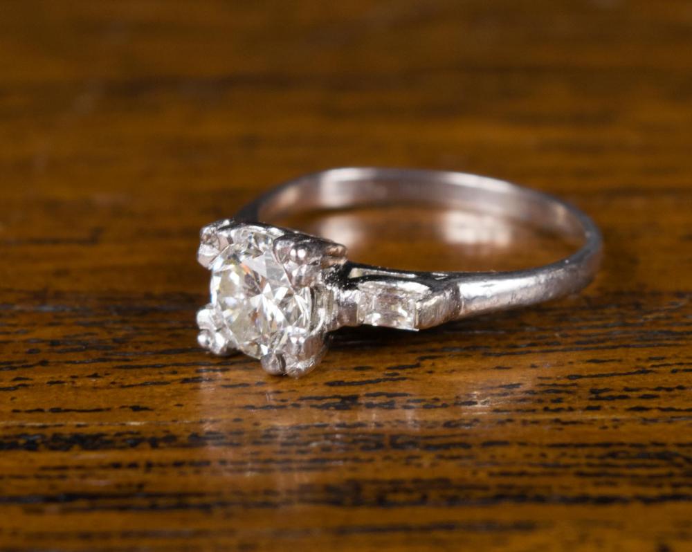 Appraisal: ESTATE DIAMOND AND PLATINUM RING WITH APPRAISAL The vintage platinum