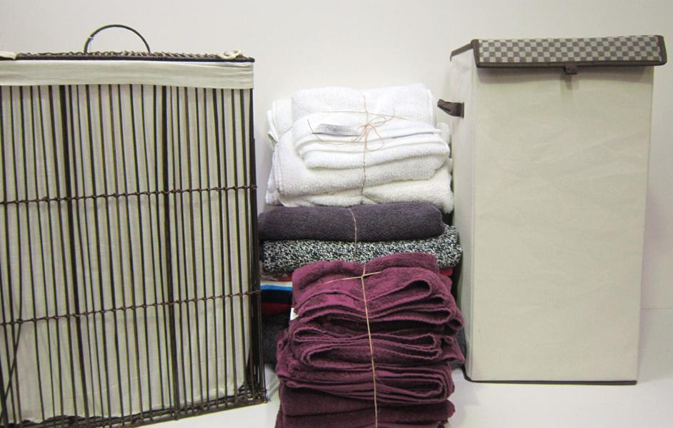 Appraisal: A VARIETY OF BATH TOWELS AND TWO LAUNDRY BASKETS A