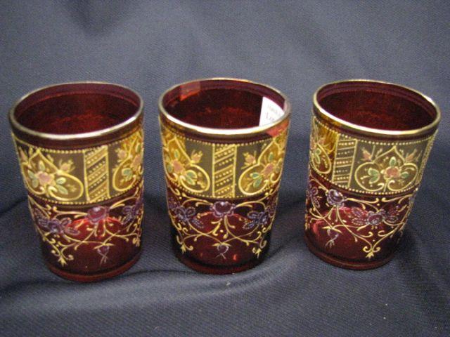 Appraisal: Victorian Moser Cranberry Art Glass Tumblers gold enamel decor