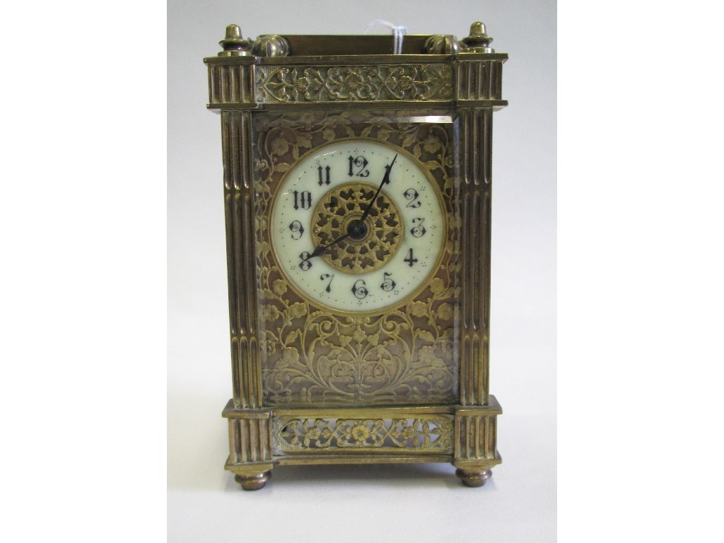 Appraisal: Brass cased carriage clock with gilded metal fret work panels