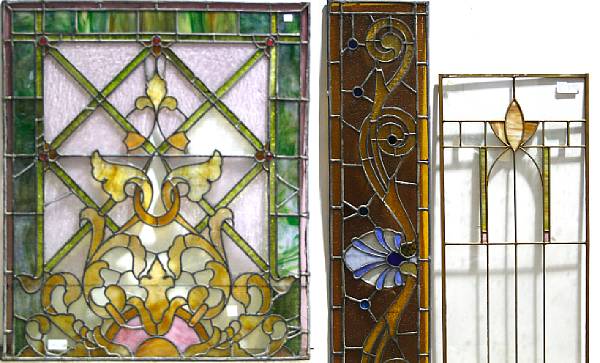 Appraisal: A group of four stained and leaded glass panels and