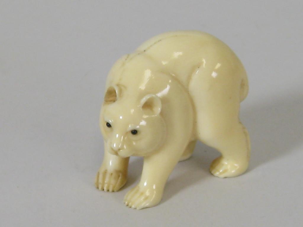 Appraisal: An ivory Netsuke in the form of a polar bear