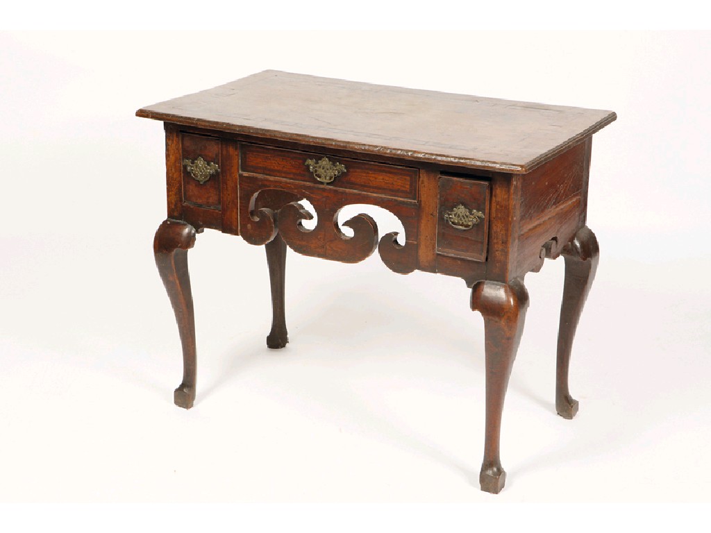 Appraisal: A GEORGE II OAK SIDE TABLE the rectangular top with