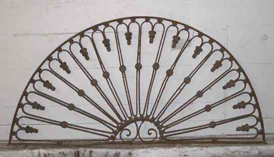 Appraisal: A Wrought Iron Arched Transom Grill circa having vertical bars