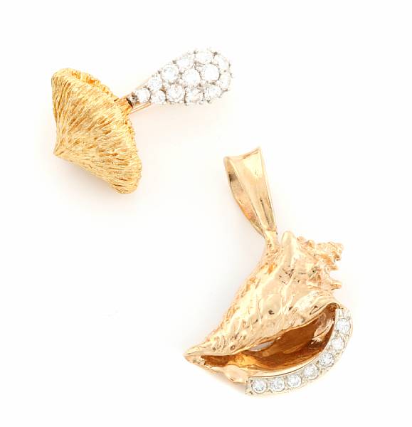 Appraisal: A diamond and gold mushroom motif brooch with a diamond