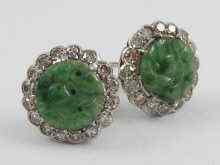 Appraisal: A pair of white metal tests ct gold jade and