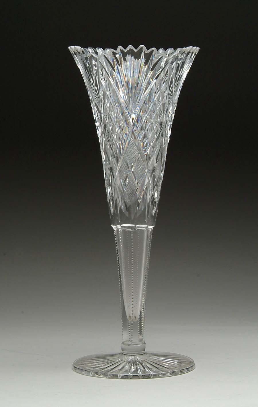 Appraisal: CUT GLASS TRUMPET VASE Tall cut glass trumpet vase is