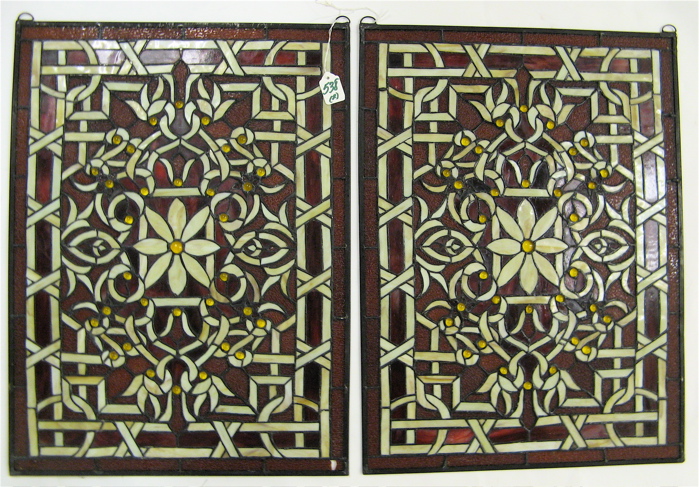 Appraisal: PAIR STAINED AND LEADED GLASS WINDOW PANELS Red borders and