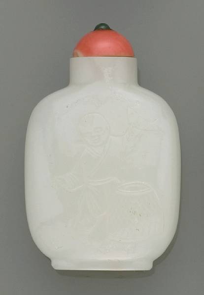 Appraisal: A carved white jade snuff bottle Late th Century The