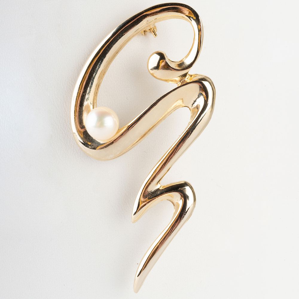 Appraisal: Gold Tone Zig-Zag Pin Set with a pearl together with