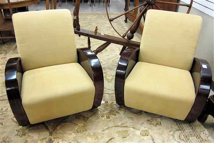 Appraisal: A PAIR OF ART DECO STYLE ROSEWOOD CLUB CHAIRS having