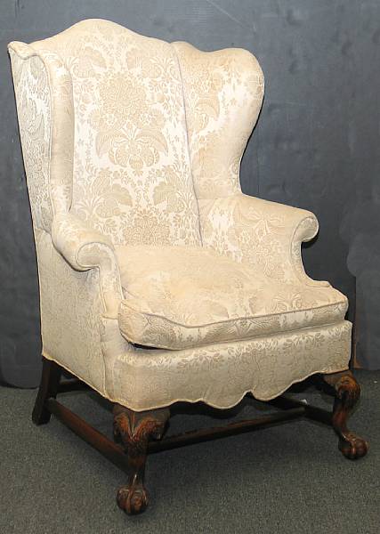 Appraisal: A George III style mahogany wing chair first half th