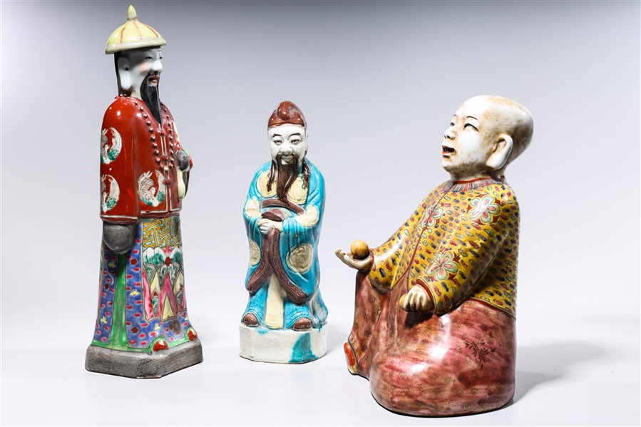 Appraisal: Group of three Chinese glazed porcelain figures x x tallest