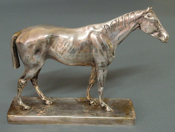 Appraisal: Statue of a racehorse silver colored over metal h base