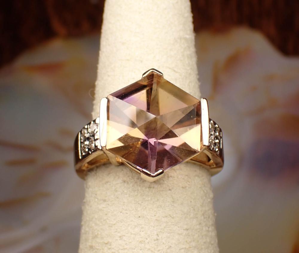 Appraisal: AMETRINE DIAMOND AND FOURTEEN KARAT GOLD RING The yellow and