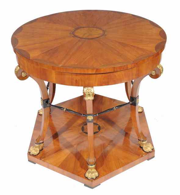 Appraisal: A CONTINENTAL SATIN BIRCH CIRCULAR CENTRE TABLE the top inlaid