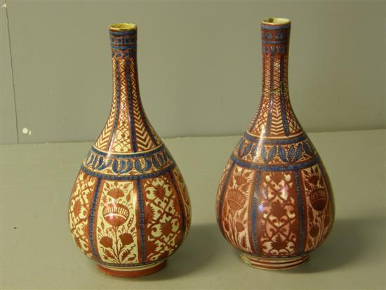 Appraisal: Pair of th century Cantigalli pink lustre bottle vases with