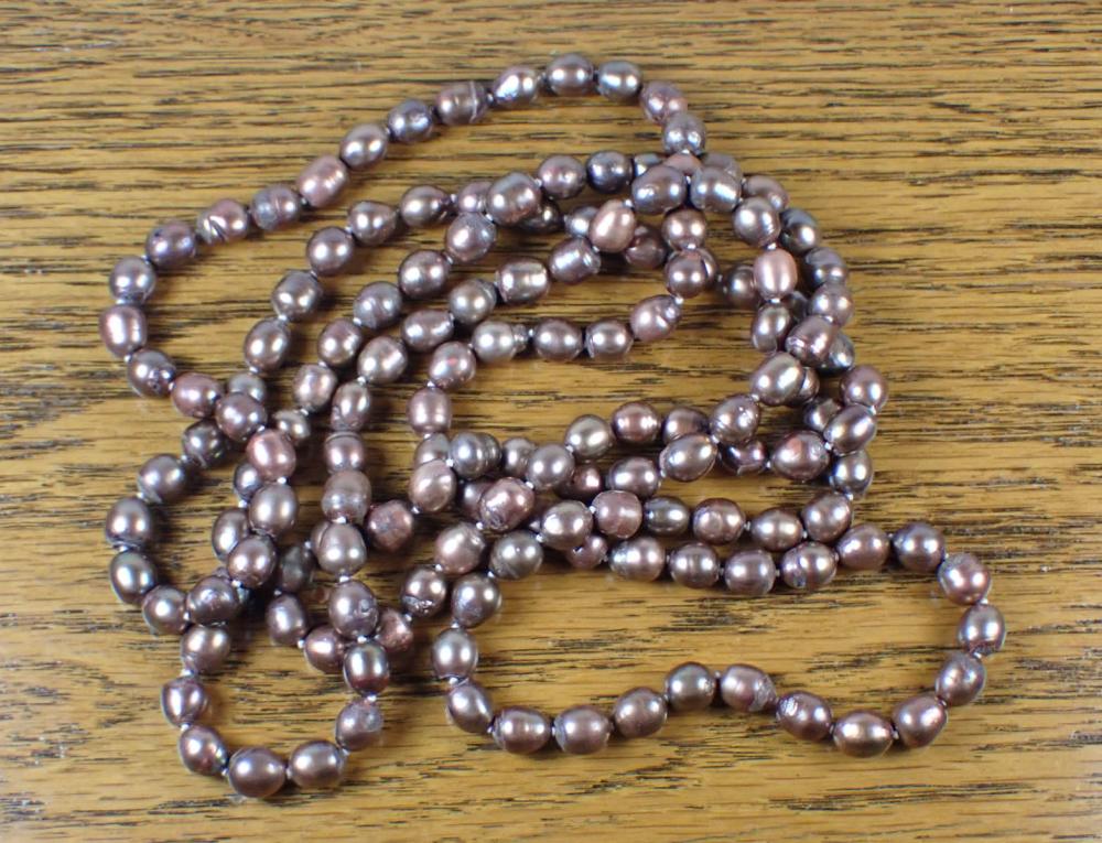 Appraisal: ROPE LENGTH CHOCOLATE PEARL NECKLACE hand-knotted strand of well matched