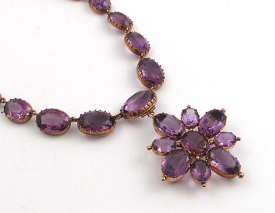 Appraisal: A Victorian amethyst riviere necklace with pendant The graduated oval