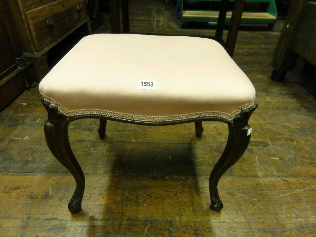 Appraisal: A Victorian rose wood stool with rectangular upholstered seat raised