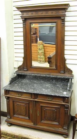 Appraisal: MARBLE-TOPPED WALNUT DRESSER WITH ATTACHED MIRROR Continental c having a