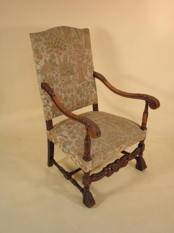 Appraisal: A Continental walnut open armchair with tapestry type padded back