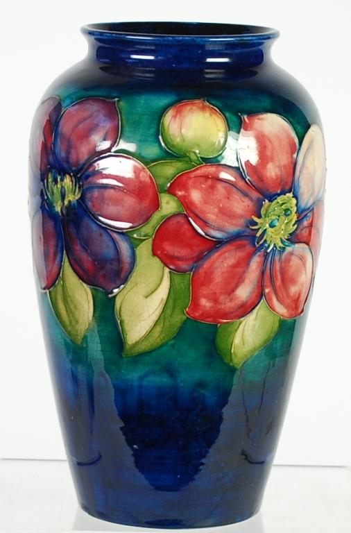 Appraisal: WALTER MOORCROFT 'CLEMATIS' PATTERN TUBE LINED POTTERY LARGE OVULAR VASE