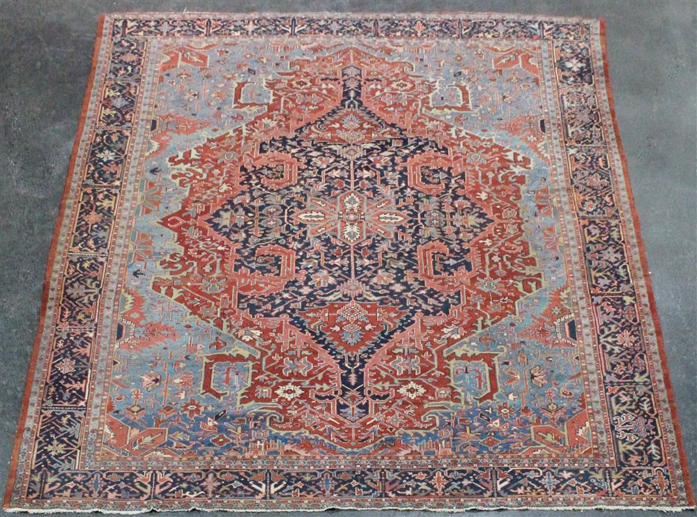 Appraisal: LARGE PERSIAN SERAPI WOOL RUG central medallion primarily blues reds