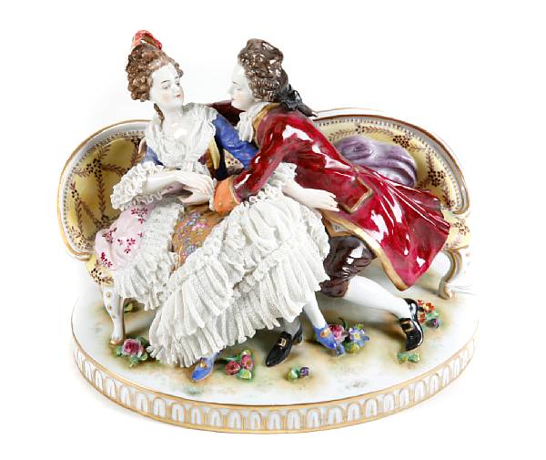 Appraisal: A Continental porcelain crinoline figural group height in