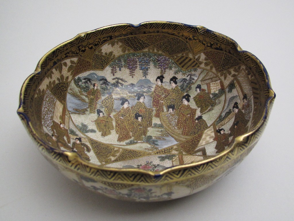 Appraisal: A Satsuma bowl painted with panels of figures on terraces