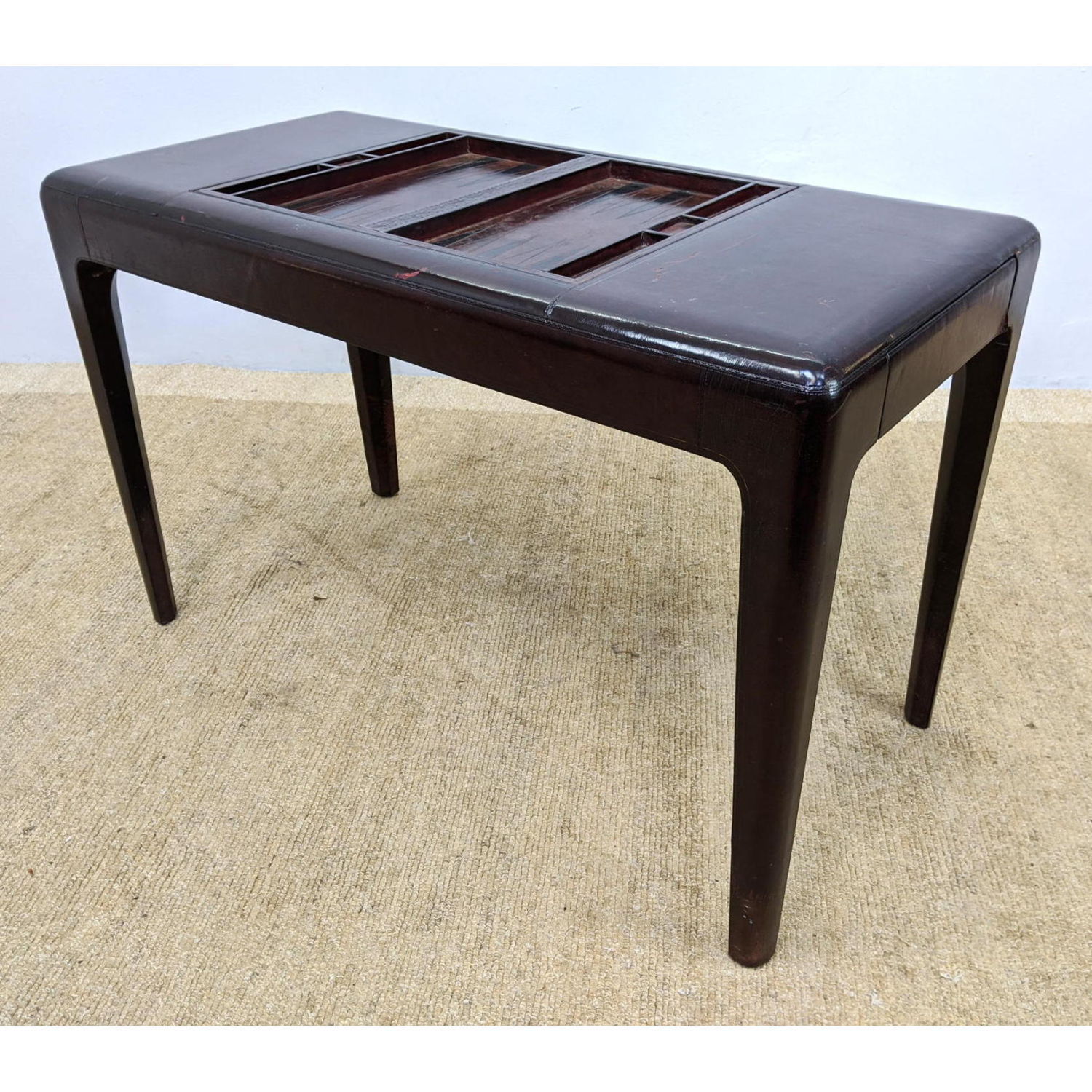 Appraisal: Dark Stained Leather Wrapped Modernist Game Table Backgammon top flips