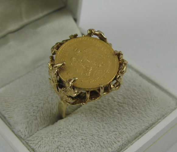 Appraisal: GOLD COIN AND FOURTEEN KARAT GOLD RING the leaf and