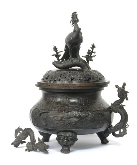 Appraisal: A CHINESE BRONZE INCENSE BURNER the pierced lid surmounted by