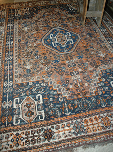 Appraisal: A LARGE IRANIAN FLOOR RUG The central medallion within a