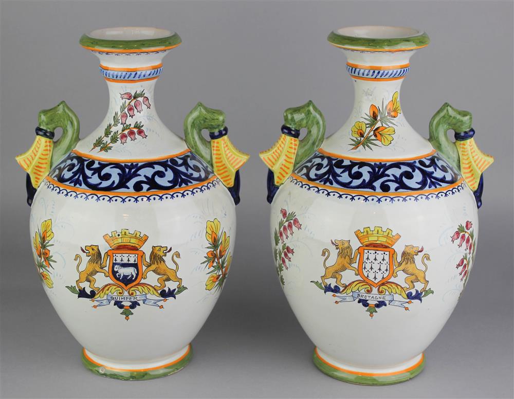 Appraisal: PAIR OF HENRIOT QUIMPER FAIENCE TWO-HANDLED VASES black HENRIOT QUIMPER