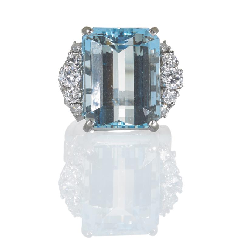 Appraisal: AQUAMARINE AND DIAMOND WHITE GOLD RING Rectangular step cut aquamarine