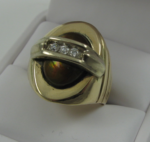 Appraisal: MAN'S FIRE AGATE AND DIAMOND RING k yellow gold and