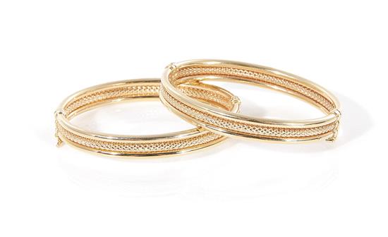 Appraisal: Pair Italian gold bangles K hinged design marked W and