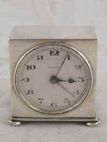 Appraisal: A silver bedroom alarm clock by Zenith hallmarked London