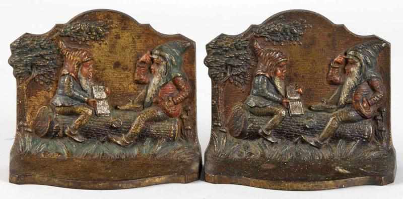 Appraisal: Pair of Cast Iron Reading Gnomes Bookends Description Made by