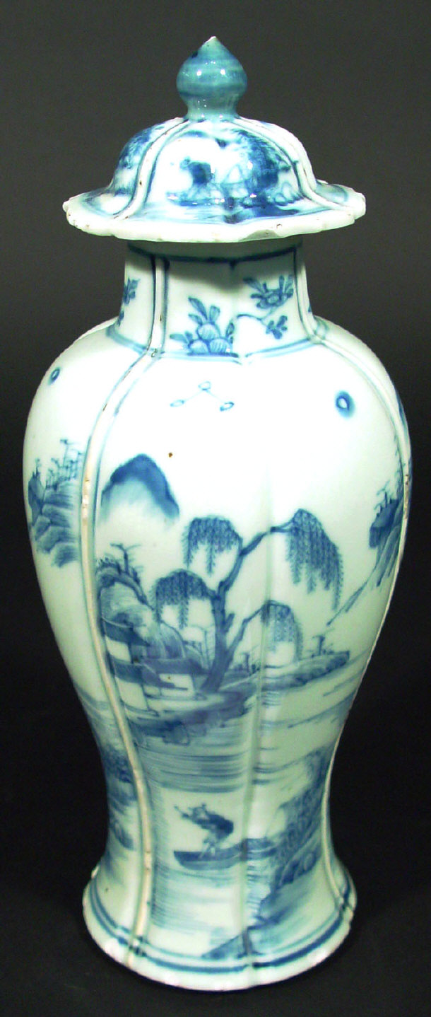 Appraisal: Oriental fluted porcelain vase and cover of baluster form painted