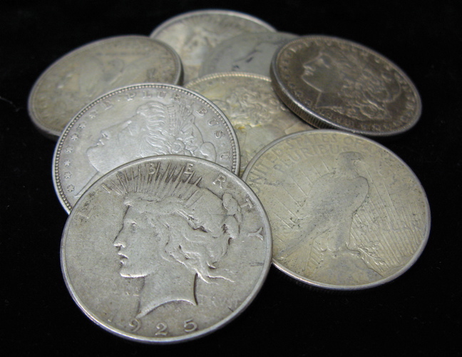 Appraisal: EIGHT U S SILVER DOLLARS Morgan types -O -P -P