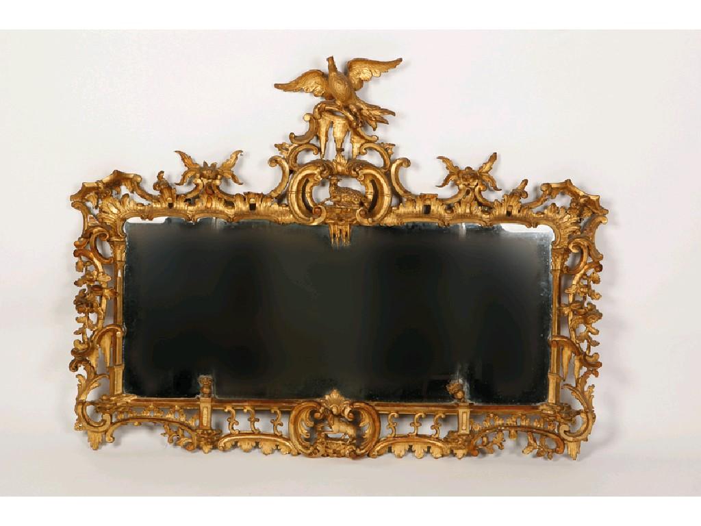 Appraisal: A GEORGE III CARVED GILTWOOD MIRROR of Chippendale design the