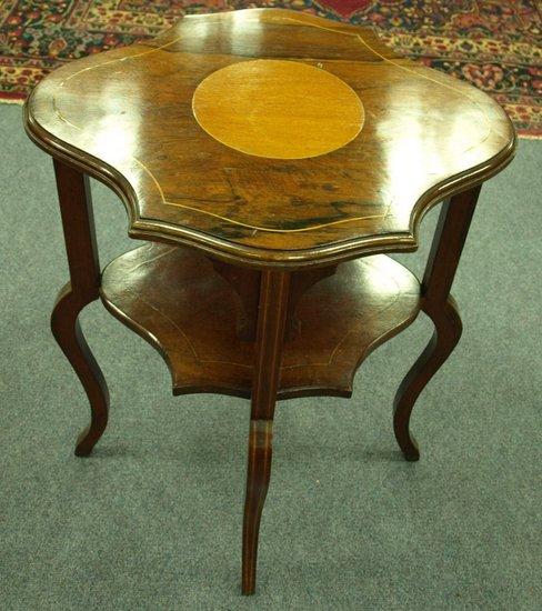 Appraisal: A late th Century rosewood and inlaid two-tier table the