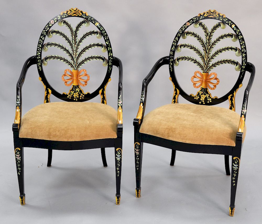 Appraisal: Pair of wheel back paint decorated arm chairs with prince